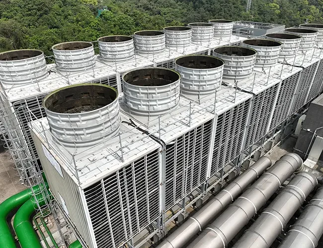 industrial rooftop cooling towers and HVAC piping system in a facility